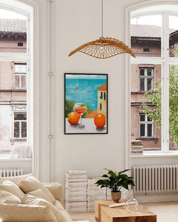 Aussicht auf Meer von Balkon aus, Glas Wein und Orangen daneben